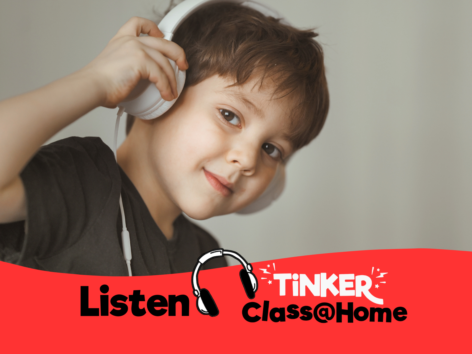 Smiling boy wearing white headphones, listening to 'Tinker Class@Home' audio content.
