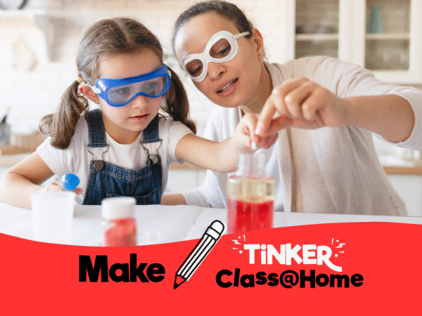 Mother and child in safety goggles performing a science experiment with colored liquids for 'Tinker Class@Home'.